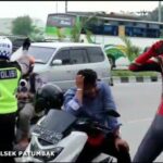 Pria Berkostum Spiderman Ditilang
