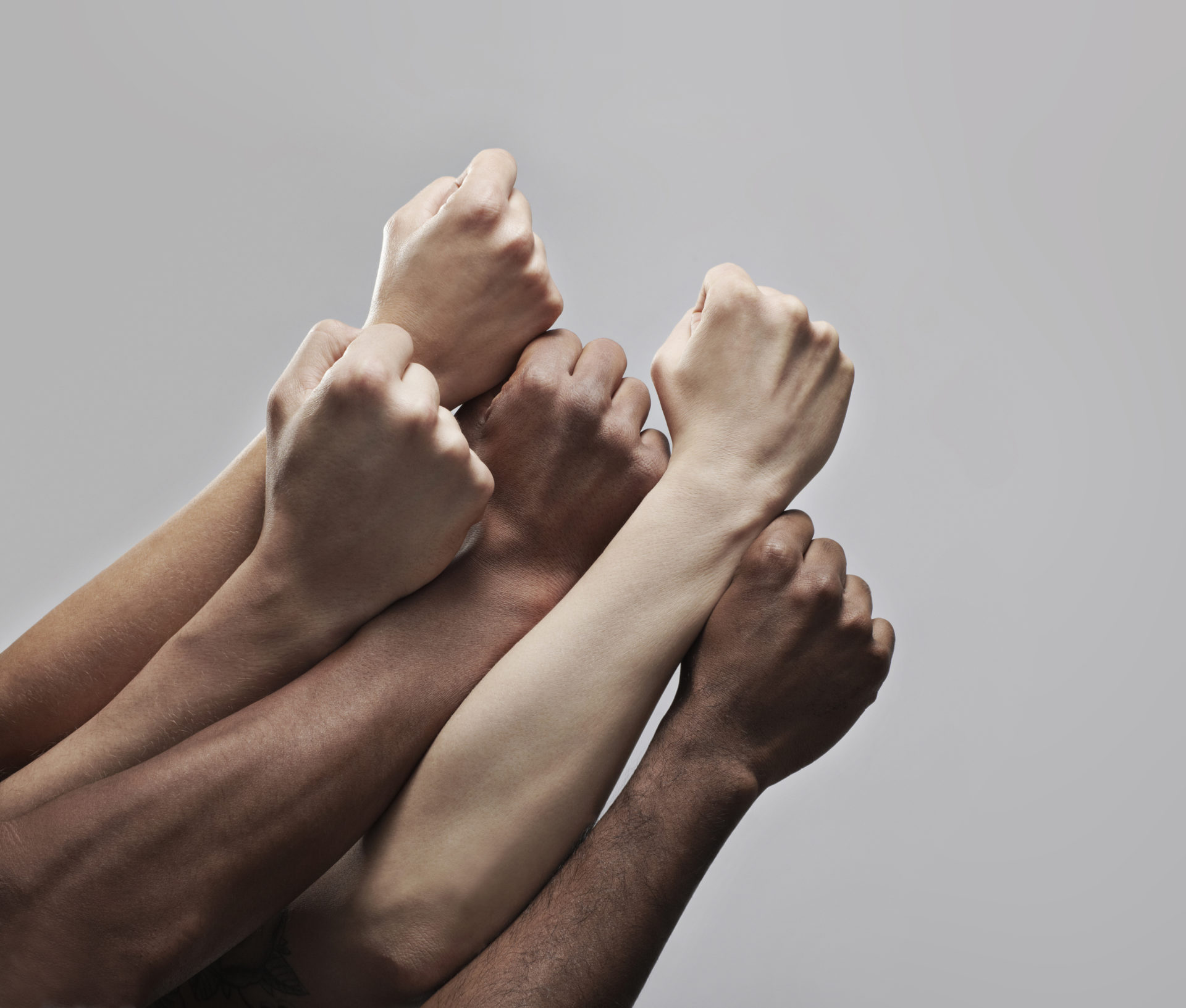 Group 5 Fists Hold Closely Together