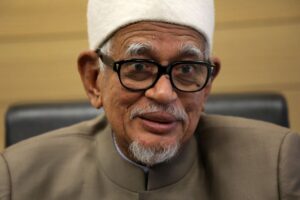 president of the pan malaysian islamic party abdul hadi awang speaks during an interview with reuters, in kuala lumpur